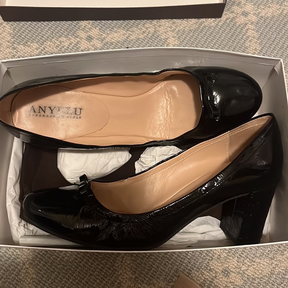 Anyi Lu Heels